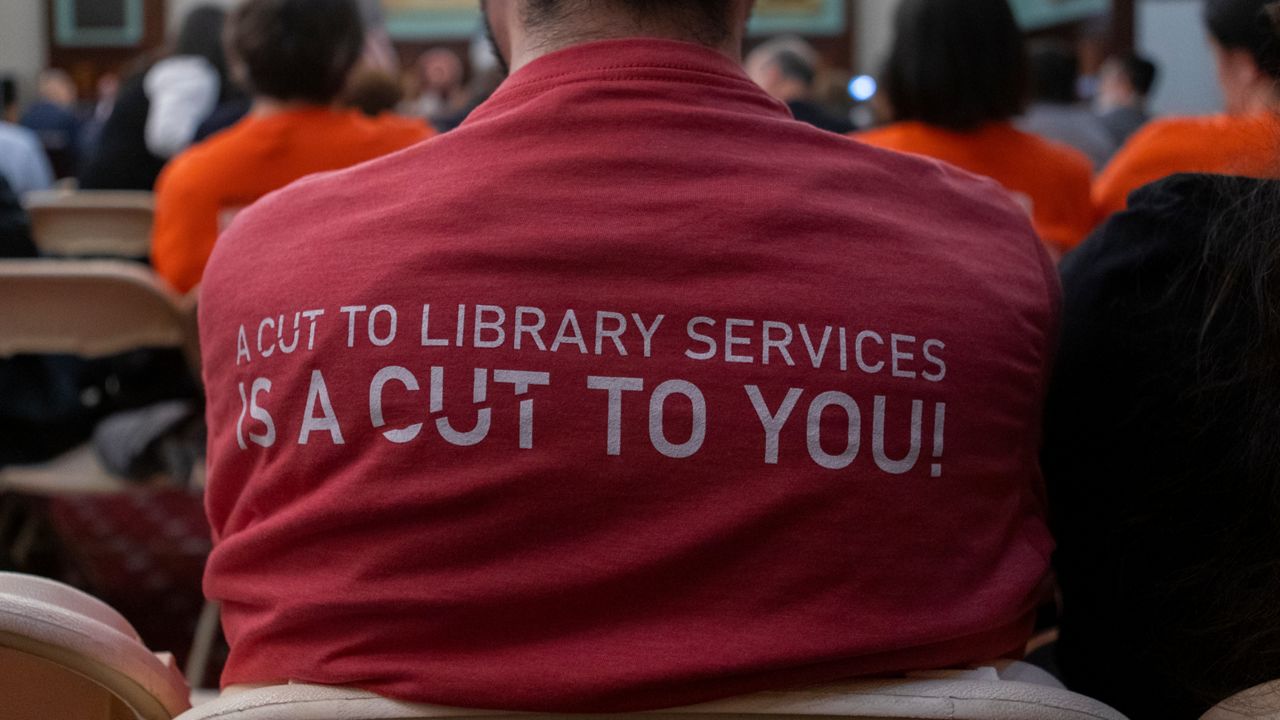 If proposed cuts go through, library leaders say New Yorkers could see the end of six-day service, as well as fewer books and programs. (AP Photo/Ted Shaffrey)