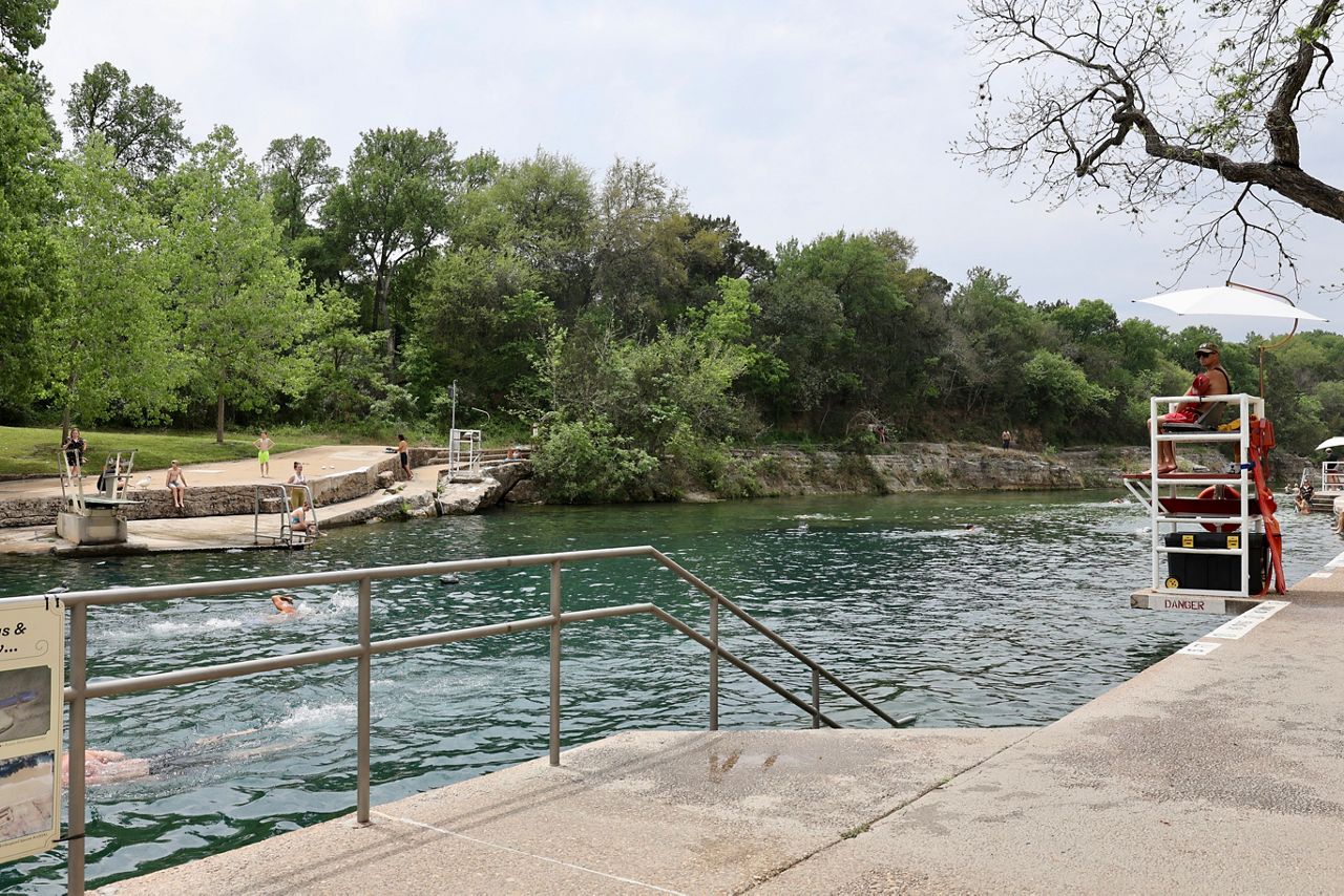 Swimmers enjoy Barton Springs Pool in Austin, Texas, in this image from April 2022. (Spectrum News 1/Lakisha Lemons)