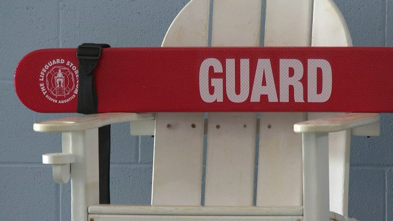 A lifeguard chair sits empty at a public pool in New York City. (Spectrum News NY1)