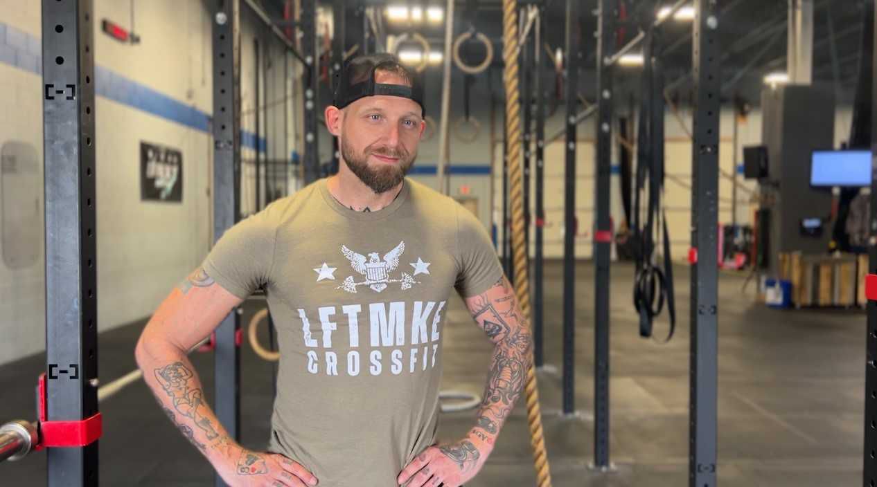 Dan Newberry poses inside 