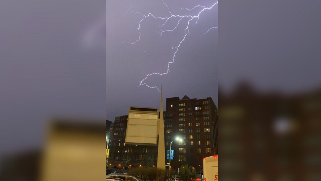 A Missouri Department of TranspLightning streaks trough the sky over downtown St. Louis as severe weather pushed through the region on March 31, 2023. (Courtesy: GregoryBakerSTL /Twitter)ortation camera shows U.S. 61 in Troy, Mo. on Friday March 31, 2023. (MoDOT)