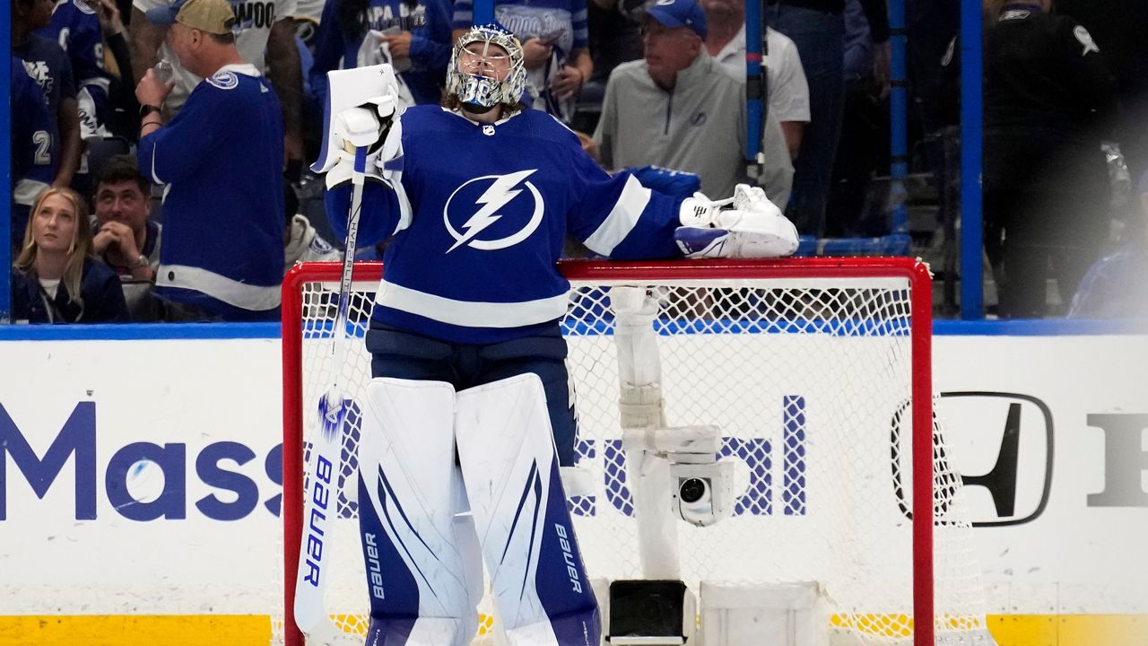 Tampa Bay Lightning goaltender Andrei Vasilevskiy (88) reacts after losing to the Toronto Maple Leafs during overtime in Game 6 of an NHL hockey Stanley Cup first-round playoff series Saturday, April 29, 2023, in Tampa, Fla. (AP Photo/Chris O'Meara)