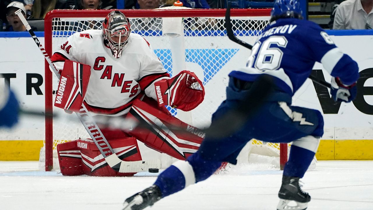 Carolina Hurricanes goaltender Petr Mrazek (34) can't stop a goal by Tampa Bay Lightning right wing Nikita Kucherov during the third period in Game 4 of an NHL hockey Stanley Cup second-round playoff series Saturday, June 5, 2021, in Tampa, Fla. (AP/Chris O'Meara)