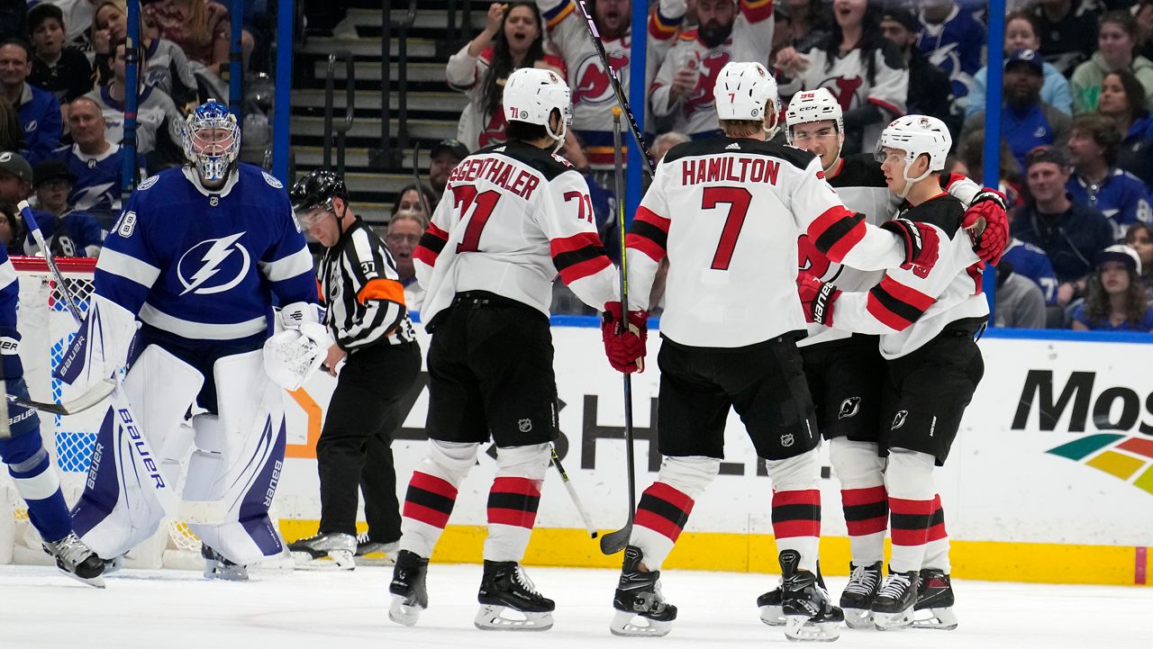 Devils rally for 5-2 win over Lightning