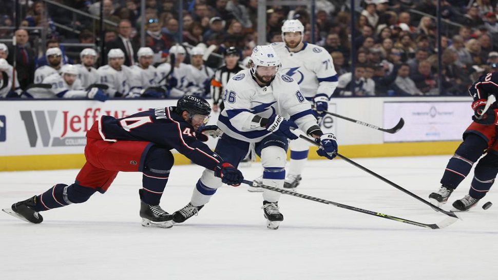 Tampa Bay Lightning's Steven Stamkos, right, celebrates with teammate Ondrej Palat (18) after scoring a goal during the third period of an NHL hockey game against the New York Islanders, Friday, April 29, 2022, in Elmont, N.Y. (AP Photo/Frank Franklin II)