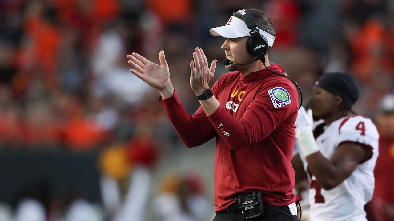 Southern California coach Lincoln Riley applauds during the first half of the team's NCAA college football game against Oregon State on Saturday, Sept. 24, 2022, in Corvallis, Ore. (AP Photo/Amanda Loman)