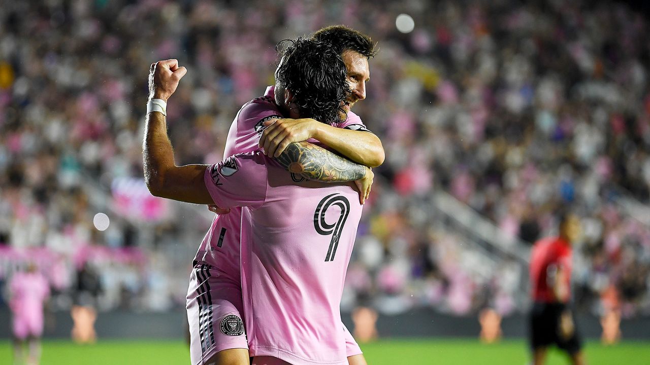 Inter Miami forward Lionel Messi celebrates his goal against Charlotte FC with Leonardo Campana (9) during the second half of a Leagues Cup soccer match Friday, Aug. 11, 2023, in Fort Lauderdale, Fla. (AP Photo/Michael Laughlin)