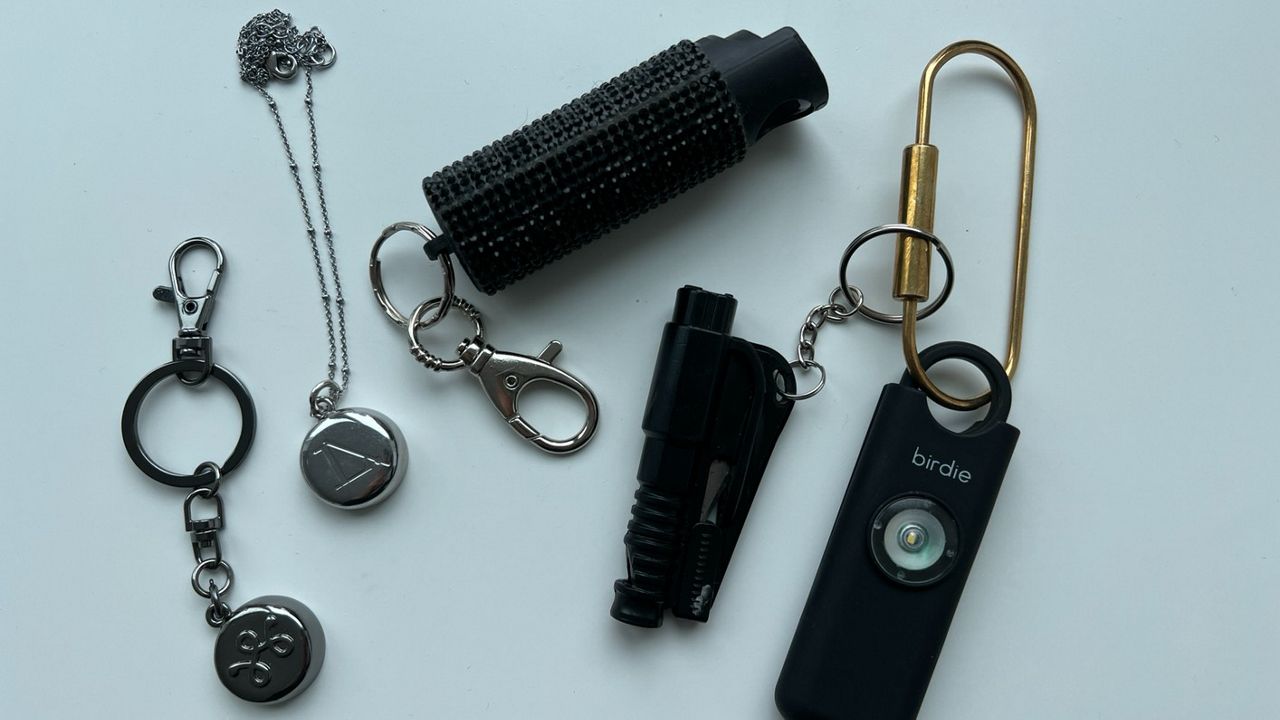 Various safety devices including pepper spray, window cutter and alarm displayed