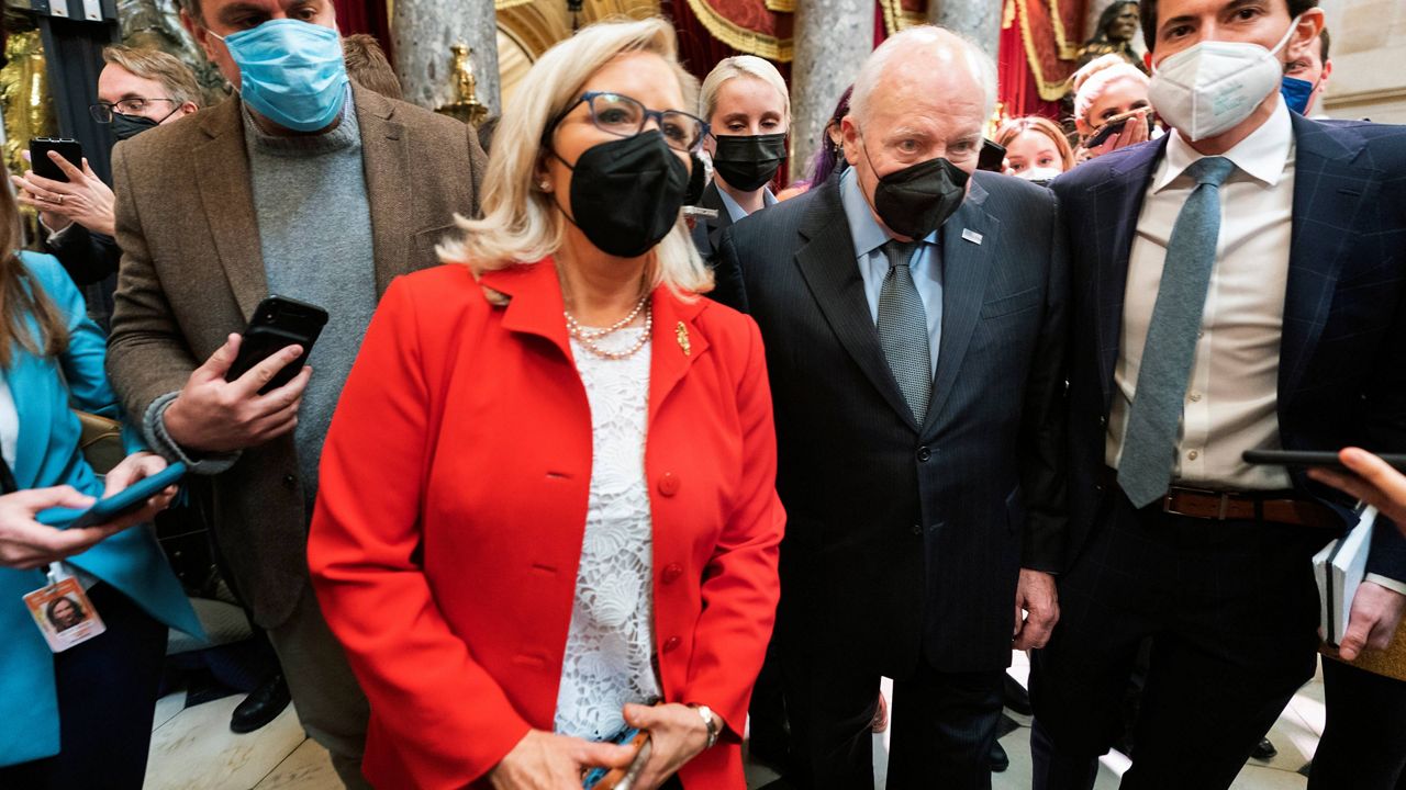 FILE - Rep. Liz Cheney, R-Wyo., vice chair of the House panel investigating the Jan. 6, 2021, U.S. Capitol insurrection, and her father, former Vice President Dick Cheney, walk in the Capitol Rotunda on Jan. 6. (AP Photo/Manuel Balce Ceneta, File)