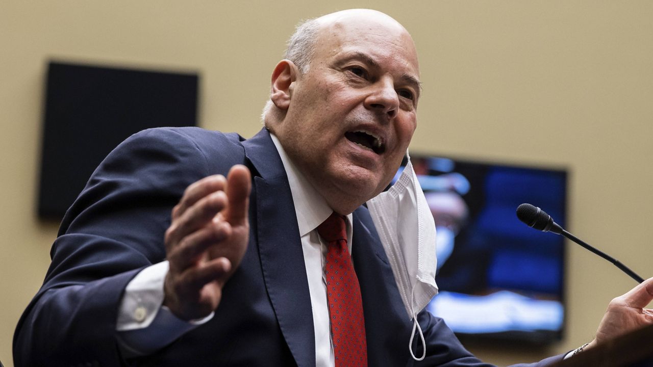 Postmaster General Louis DeJoy speaks during a House Oversight and Reform Committee hearing on Capitol Hill on Wednesday. (Graeme Jennings/Pool via AP)