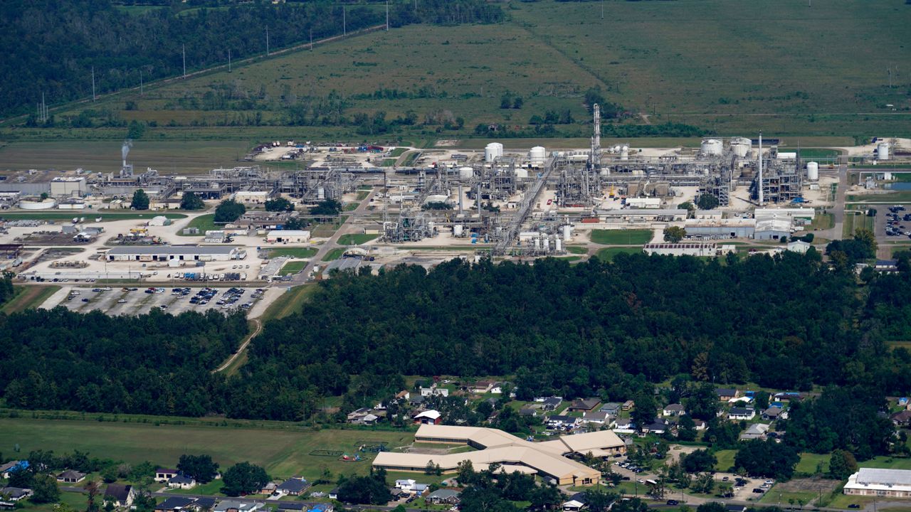 The Fifth Ward Elementary School and residential neighborhoods sit near the Denka Performance Elastomer Plant, in Reserve, La. (AP Photo/Gerald Herbert)