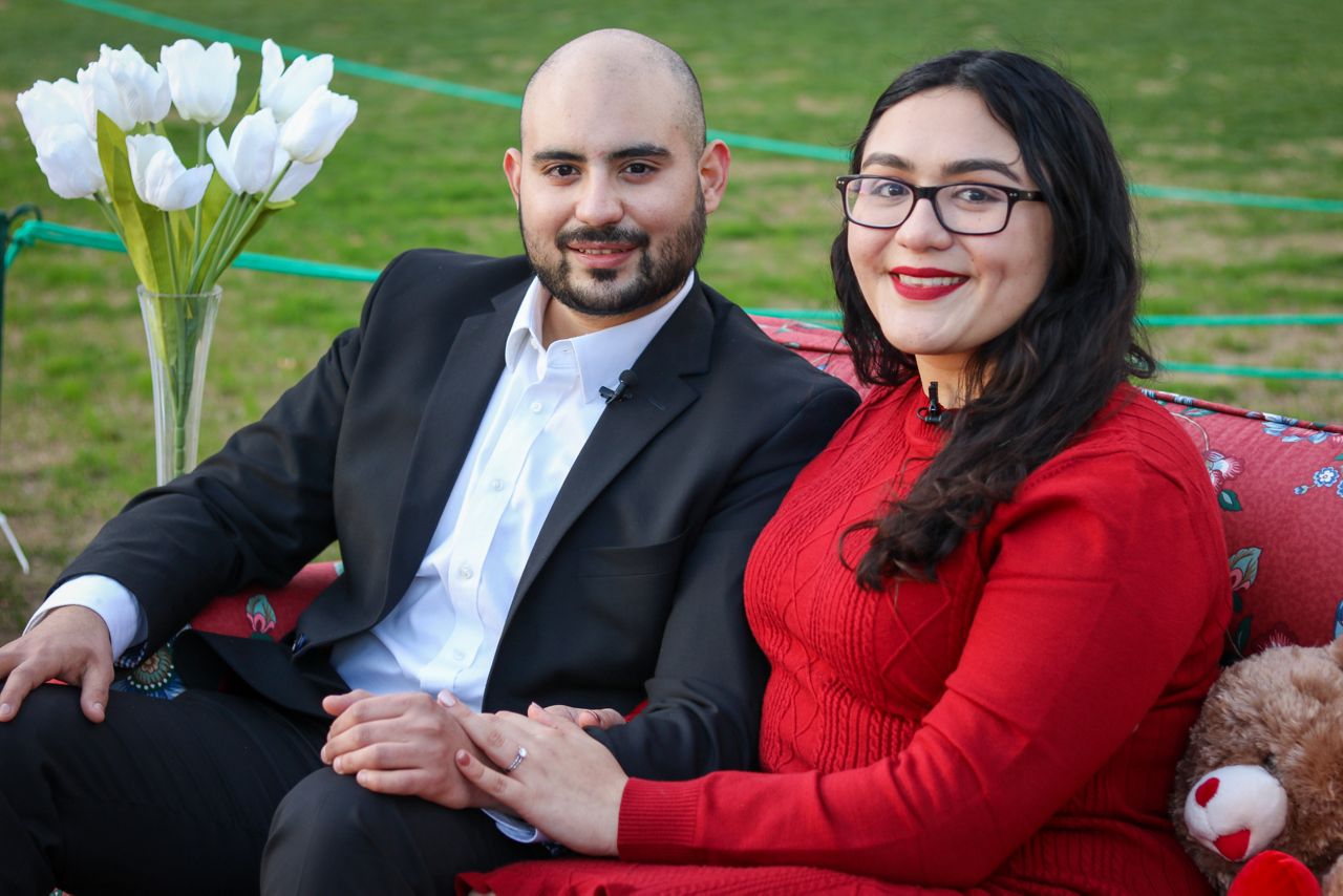 Pictured are Arlington residents Reynaldo Garza and Victoria Medrano. (Stacy Rickard/Spectrum News 1)