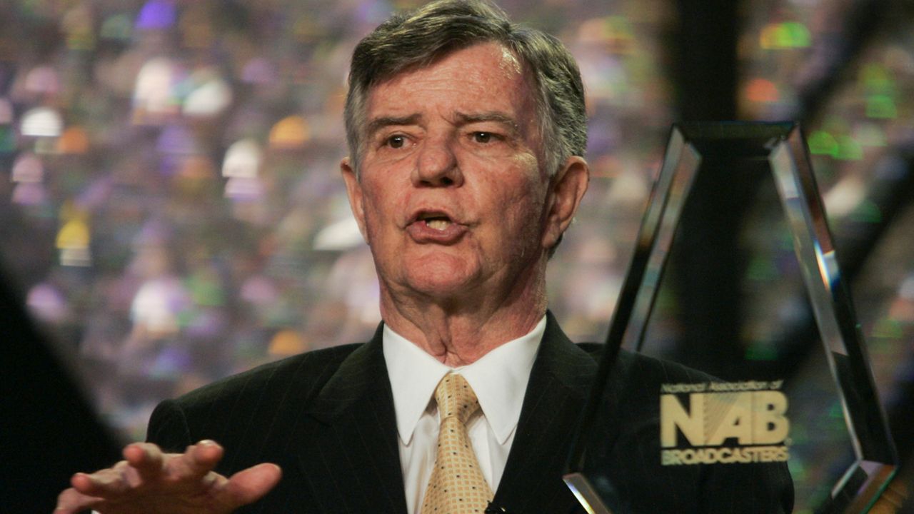 Lowry Mays, chairman of the Board of Clear Channel Communications, accepts the distinguished service award from the National Association of Broadcasters convention on April 18, 2005, in Las Vegas. Mays, whose accidental purchase of a San Antonio radio station propelled him into the nation’s largest owner of radio stations, died Monday, Sept. 12, 2022, according to his alma mater, Texas A&M University. He was 87. (AP Photo/Joe Cavaretta, File)