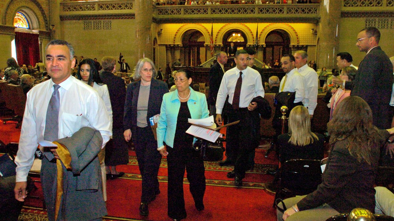 Former New York Assemblyman Luis Diaz, left, at the state capitol in 2006. (AP Photo/Tim Roske)