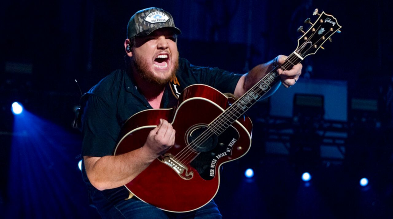 FILE - Luke Combs performs during CMA Fest 2022 in Nashville, Tenn., on June 11, 2022. Comb's latest album, "Growin' Up," releases Friday, July 1. (Photo by Amy Harris/Invision/AP, File)