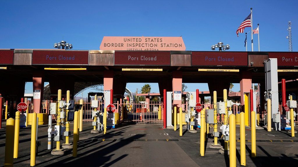 The border crossing sits closed Dec. 15, 2023, at Lukeville, Ariz. U.S. authorities say the crossing on the most direct route from Phoenix to the nearest beaches will reopen Thursday, Jan. 4, 2024, one month after it closed in response to a large migrant influx. (AP Photo/Gregory Bull, File)