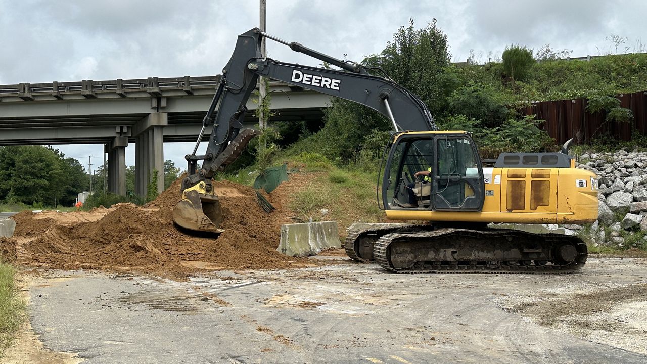 In Lumberton, city workers are reinforcing a barricade near Interstate 95 that's close to the Lumber River. 
