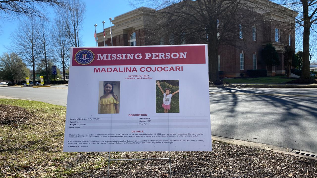 Madalina Cojocari was last seen getting off the school bus on Nov. 21, according to police. Signs in front of the Cornelius Police Department ask the public for help figuring out what happened to the 11-year-old girl. (Charles Duncan/Spectrum News 1)