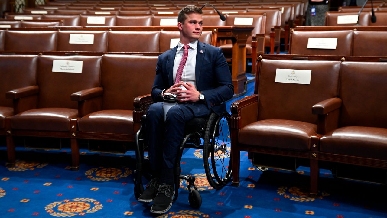 Rep. Madison Cawthorn, R-N.C., arrives in the chamber of the House of Representatives before the State of the Union address by President Joe Biden to a joint session of Congress at the Capitol on Tuesday, March 1, 2022, in Washington. (Saul Loeb, Pool via AP)