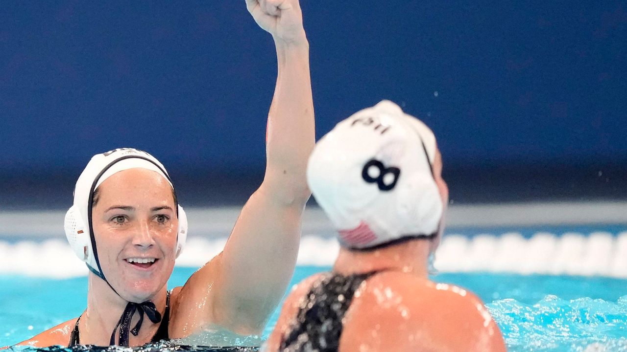 Maggie Steffens of the United States celebrates after scoring during the women's water polo final against Hungary at the World Aquatics Championships in Doha, Qatar, Friday, Feb. 16, 2024. (AP Photo/Lee Jin-man, File)