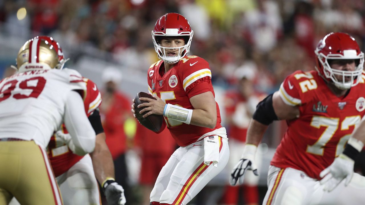 Chiefs quarterback Patrick Mahomes looks to pass during Super Bowl LIV. (AP Photo/Doug Benc)