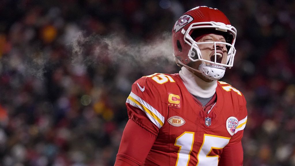 Kansas City Chiefs quarterback Patrick Mahomes (15) celebrates after throwing a touchdown pass during the first half of an NFL wild-card playoff football game against the Miami Dolphins Saturday, Jan. 13, 2024, in Kansas City, Mo. (AP Photo/Ed Zurga)