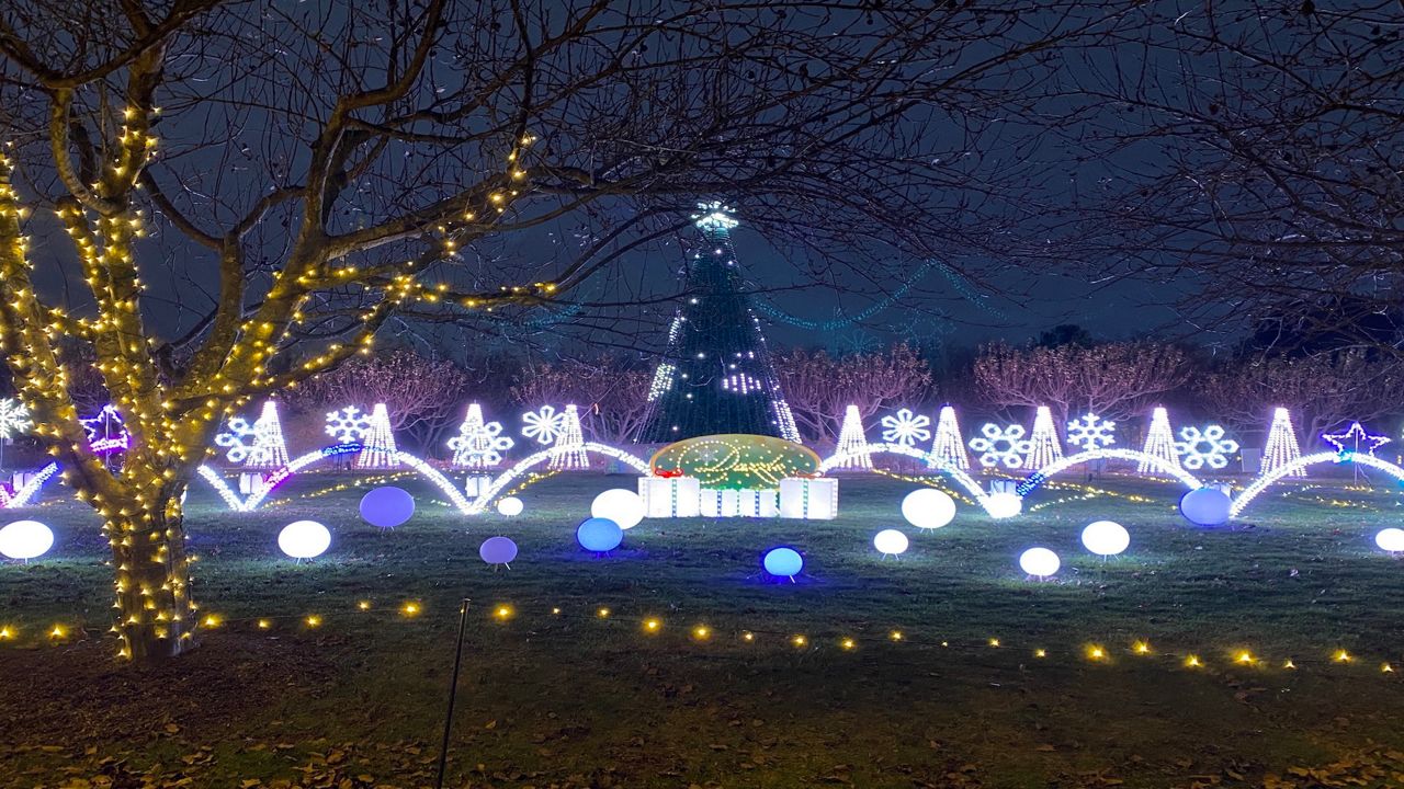 Stan Hywet’s gardens and grounds are lit by more than 1 million lights, with the choreographed, musical light show “Dazzle” in the Great Garden.