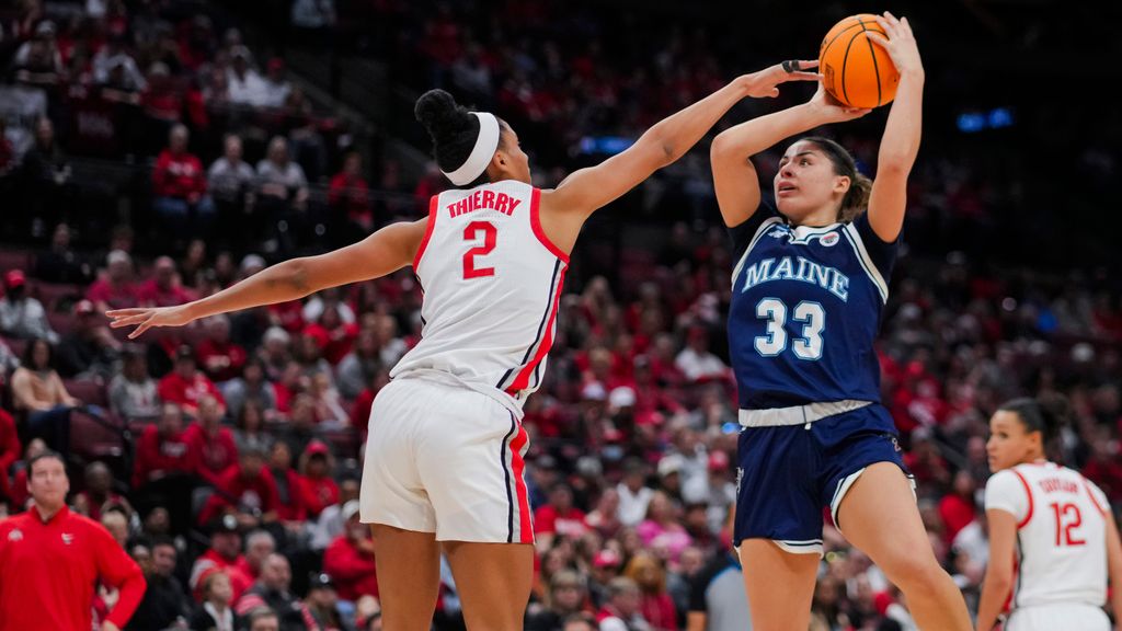 Maine forward Adrianna Smith, right, shoots over Ohio State guard Taylor Thierry during the first half of a first-round college basketball game in the women's NCAA Tournament, Friday, March 22, 2024, in Columbus, Ohio. (AP Photo/Aaron Doster)