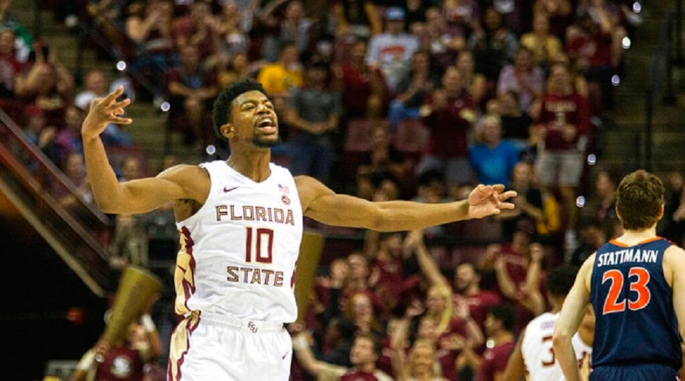 Florida State forward Malik Osborne (10) reacts to hitting a 3-point shot in the first half of the team's NCAA college basketball game against Virginia in Tallahassee, Fla., Wednesday, Jan. 15, 2020. (AP Photo/Mark Wallheiser)