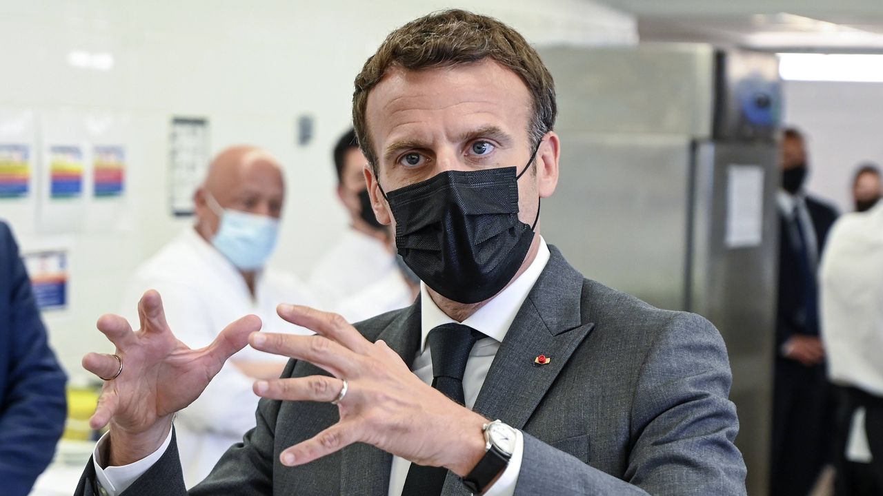 French President Emmanuel Macron talks to reporters Tuesday at the Hospitality school in Tain-l'Hermitage, southeastern France. (Philippe Desmazes, Pool via AP)