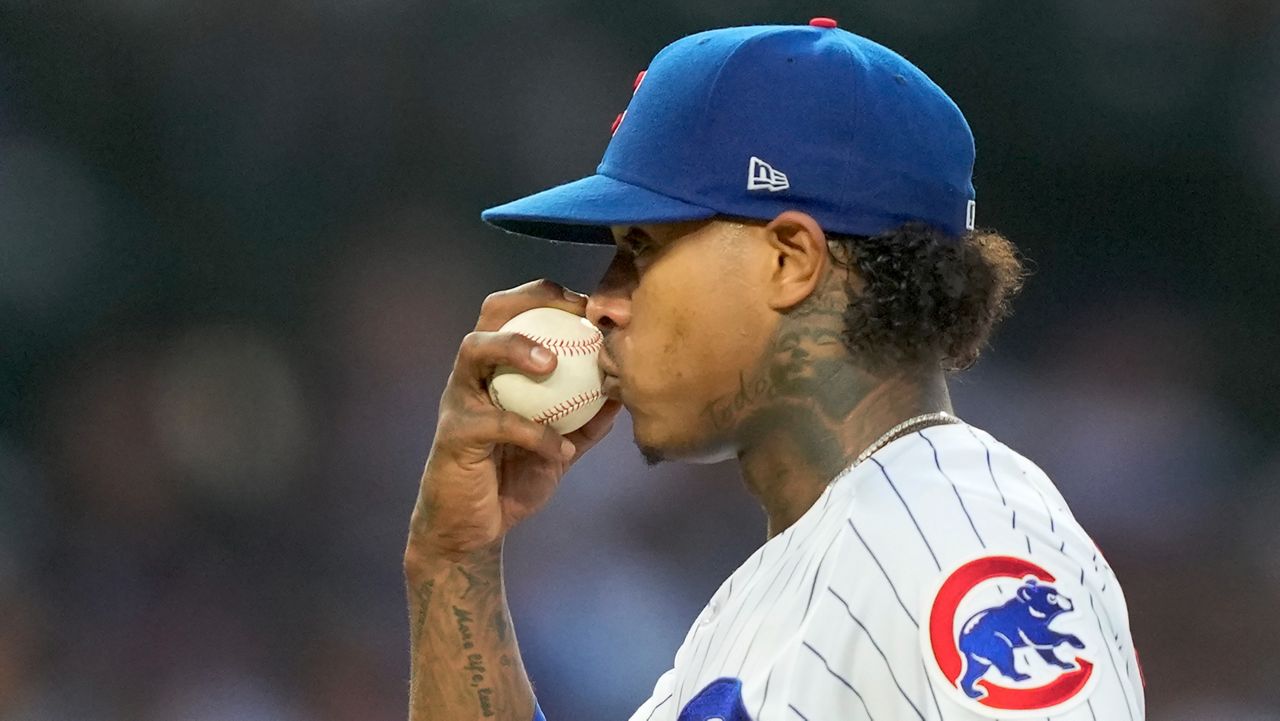 Marcus Stroman kisses the ball during a game against the St. Louis Cardinals on Thursday, July 20, 2023 in Chicago.