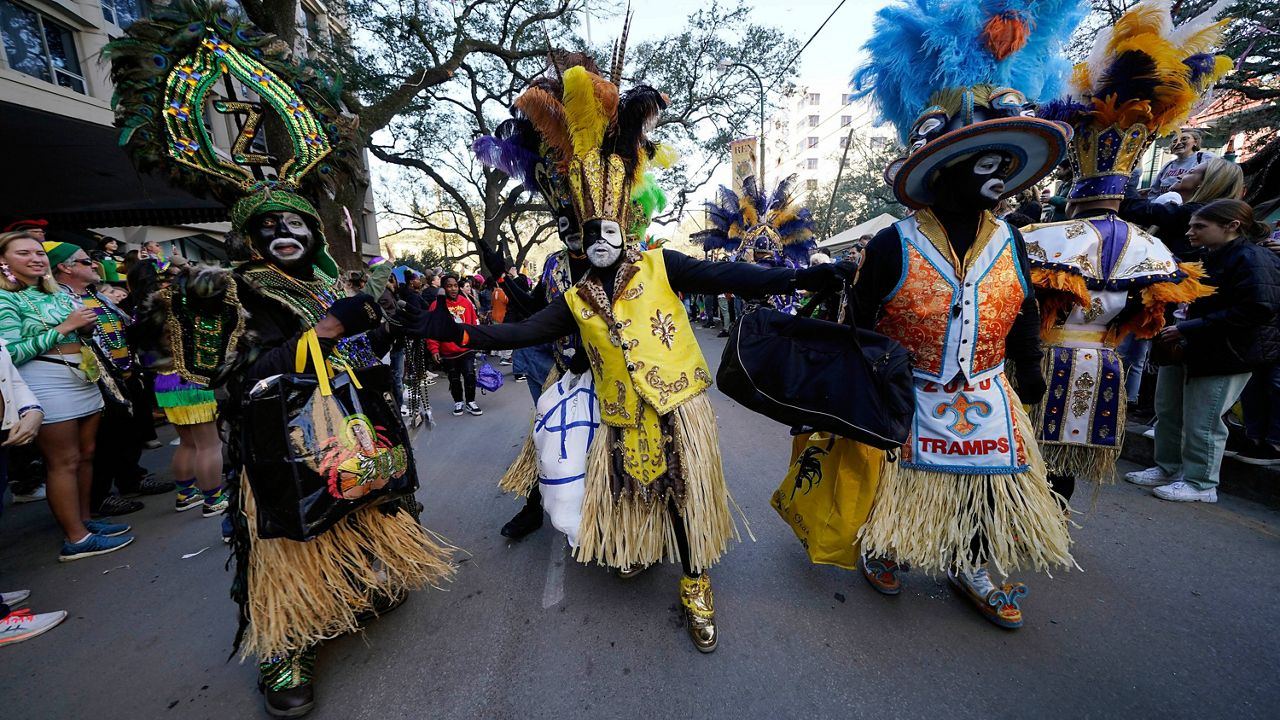 Members of the Zulu Tramps dance at the Krewe of Zulu parade during Mardi Gras on Tuesday in New Orleans. (AP Photo/Gerald Herbert)