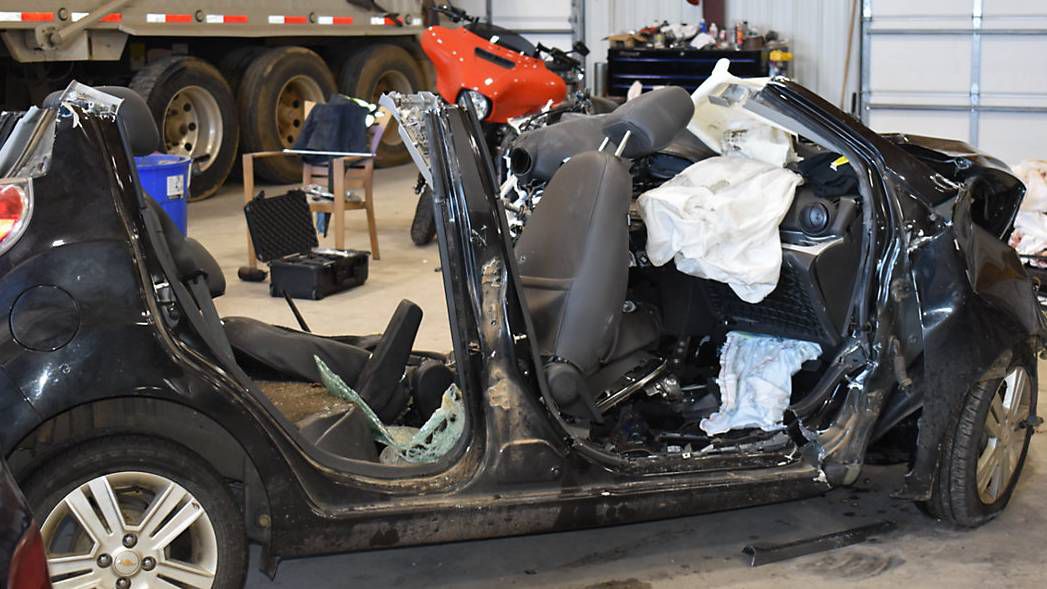 Damage to passenger car in Tishomingo, Okla., crash. (Photo courtesy of Oklahoma Department of Safety​)