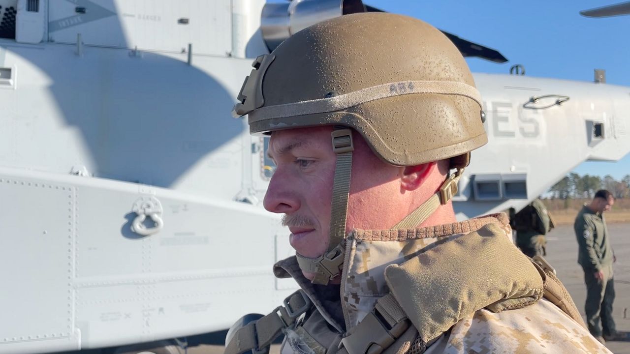 Alexander Chaucer inspects the newest CH-53K helicopter.  (Spectrum News 1/Alex Wilkinson)