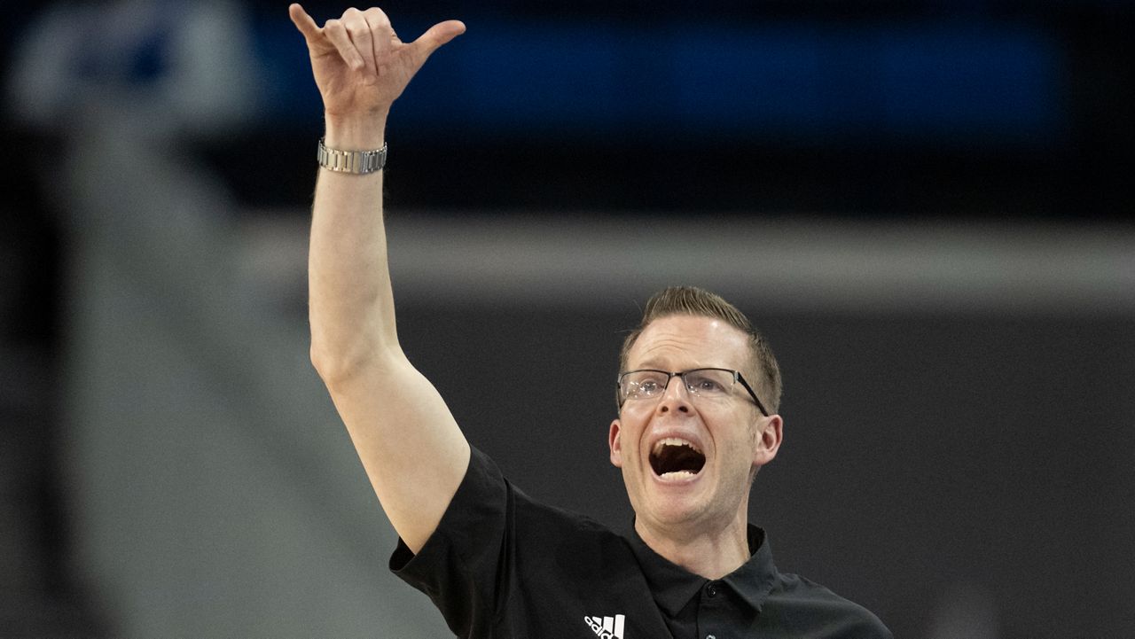 Sacramento State coach Mark Campbell instructs gestures to players during the first half of the team's first-round college basketball game against UCLA in the women's NCAA Tournament, Saturday, March 18, 2023, in Los Angeles. (AP Photo/Kyusung Gong)