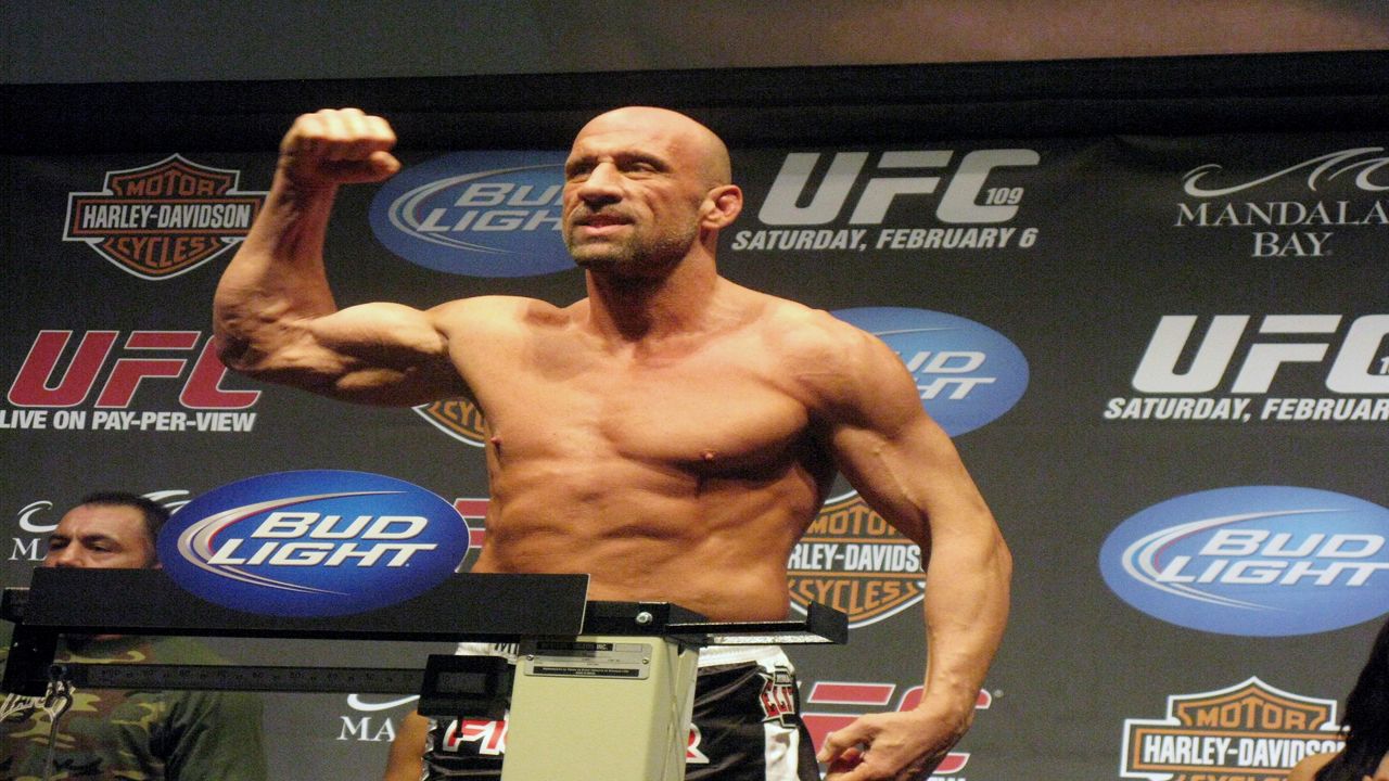 UFC Hall of Famer Mark Coleman gestures during the weigh-in ahead of his UFC 109 fight against Randy Couture Friday, Feb. 5, 2010, in Las Vegas. Former UFC champion Mark Coleman was airlifted to a hospital and was “battling for his life” after saving his parents from a house fire in Ohio this week, his daughter said on Instagram. Morgan Coleman posted Tuesday night, March 12, 2024, that her father went into the burning house several times and was able to bring out his mother and father. (Neil Davidson/The Canadian Press via AP, File)