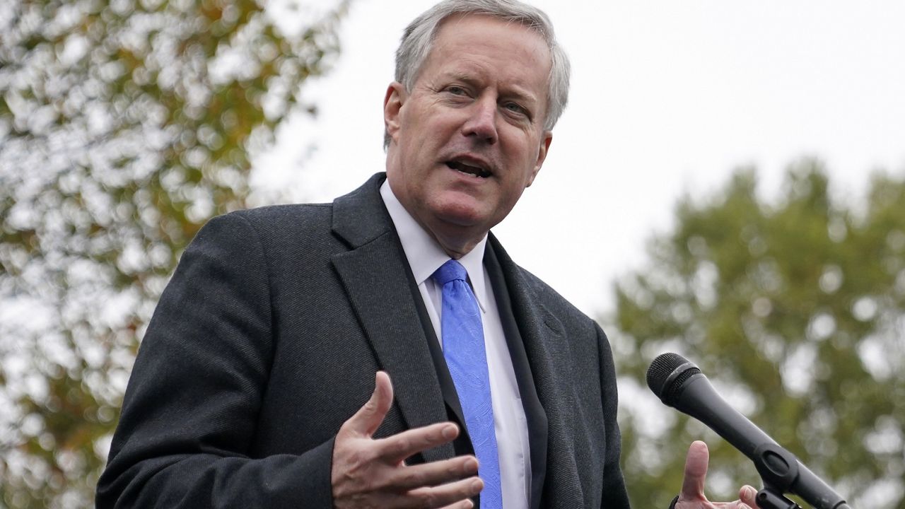 White House chief of staff Mark Meadows speaks with reporters outside the White House, Monday, Oct. 26, 2020, in Washington. (AP Photo)