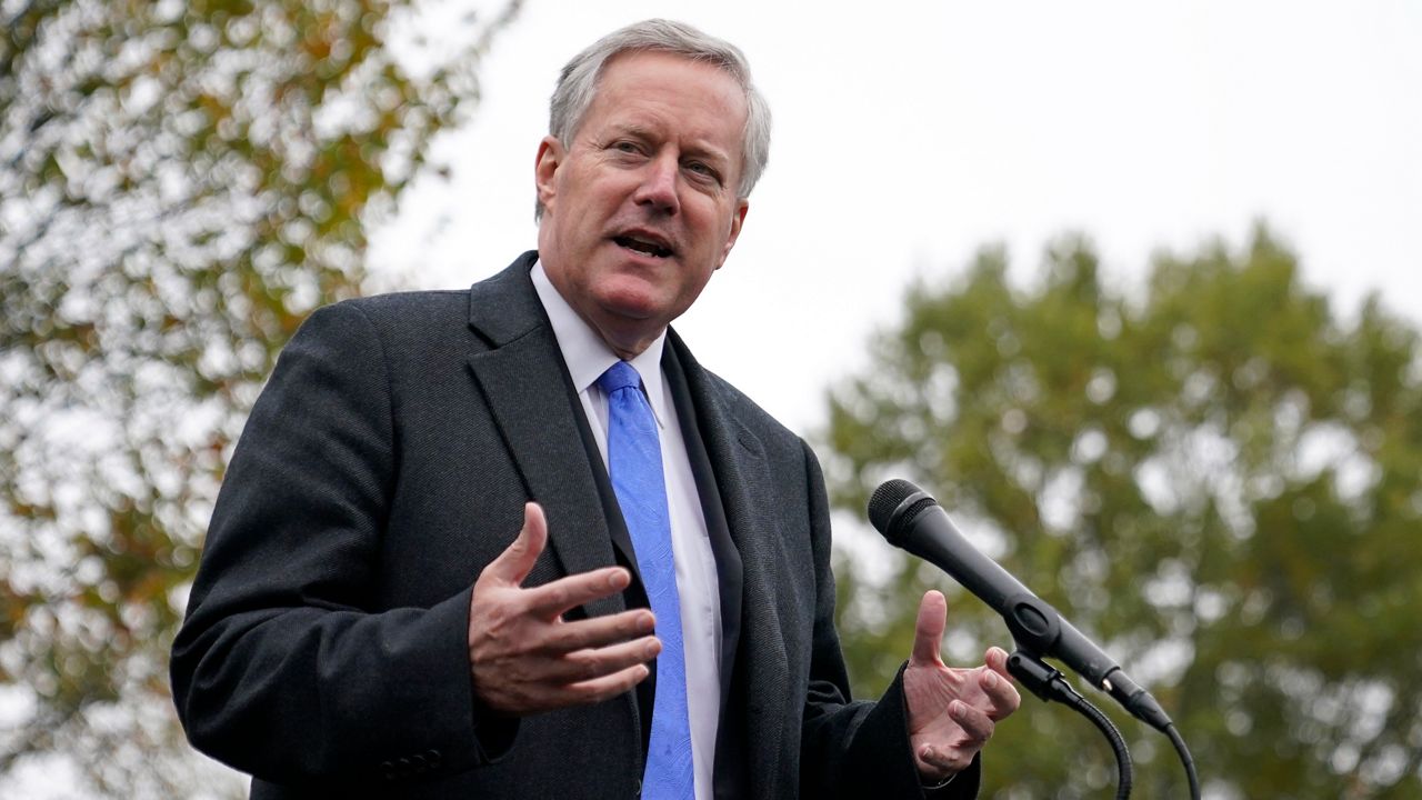 White House chief of staff Mark Meadows speaks with reporters outside the White House, Oct. 26, 2020, in Washington. Meadows is facing increasing scrutiny about his own voter registration status. (AP Photo/Patrick Semansky, File)