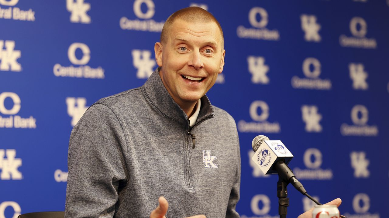 New Kentucky coach Mark Pope shows off letterman-style jacket at media day