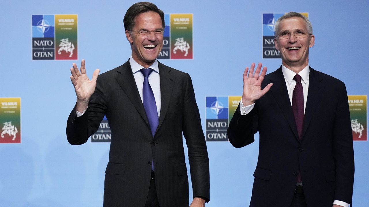  NATO Secretary General Jens Stoltenberg, right, greets Netherland's Prime Minister Mark Rutte during arrivals for a NATO summit in Vilnius, Lithuania, Tuesday, July 11, 2023. (AP Photo/Pavel Golovkin, File)