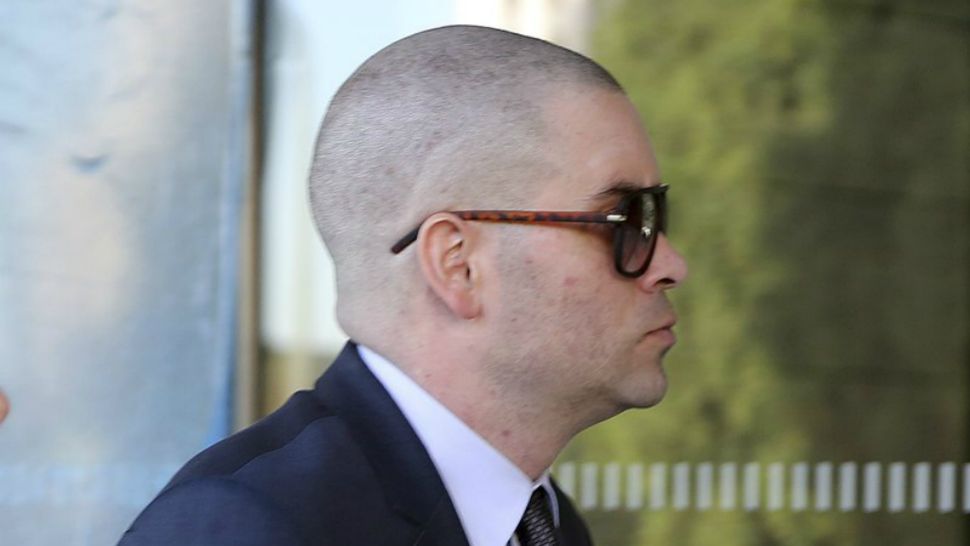 Former "Glee" actor Mark Salling arrives at federal court in Los Angeles on Monday, Dec. 18, 2017. Salling has pleaded guilty to possession of child pornography. (AP Photo/Reed Saxon)