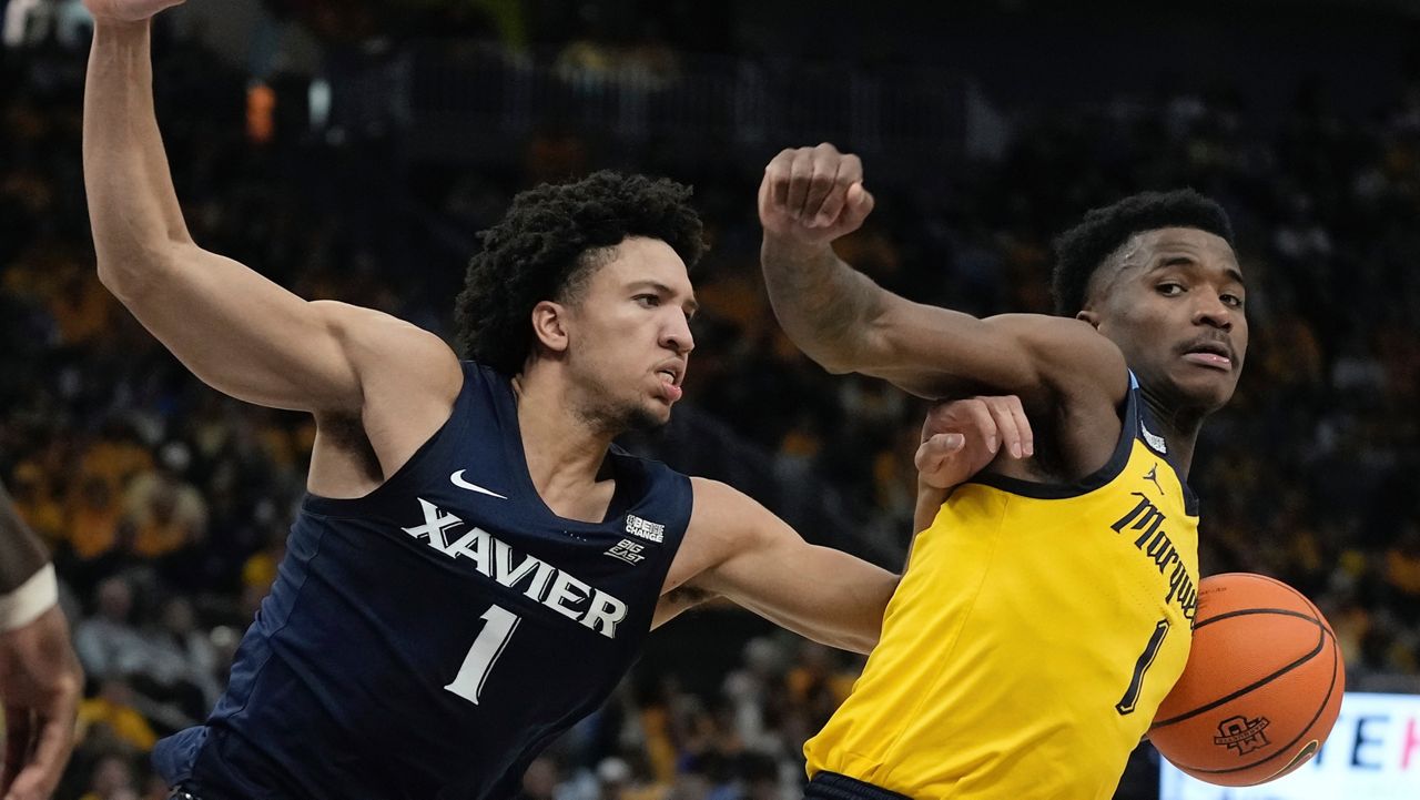 Marquette's Kam Jones tries together past Xavier's Desmond Claude