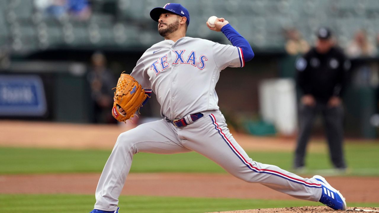 Texas Rangers starting pitcher Martin Perez throws to an Oakland Athletics batter during the first inning of a baseball game Thursday, May 26, 2022, in Oakland, Calif. (AP Photo/Darren Yamashita)