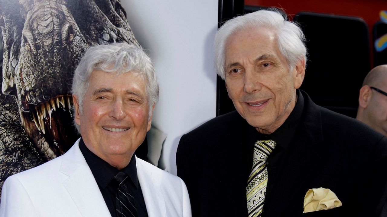 Producers Sid Krofft, left, and Marty Krofft arrive at the premiere of  "Land of the Lost," at Gramuan's Chinese Theater in Los Angeles Saturday, May 30, 2009.  (AP Photo/Reed Saxon)
