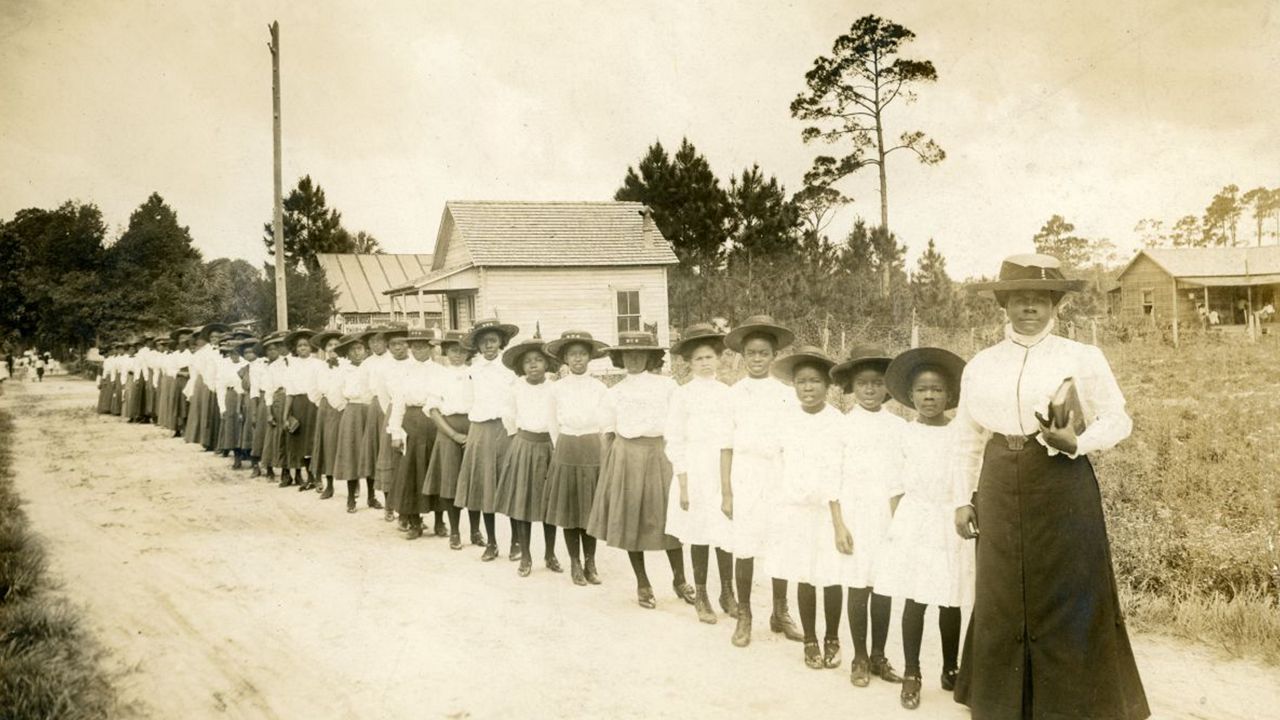Artists work on while waiting for Black history museum