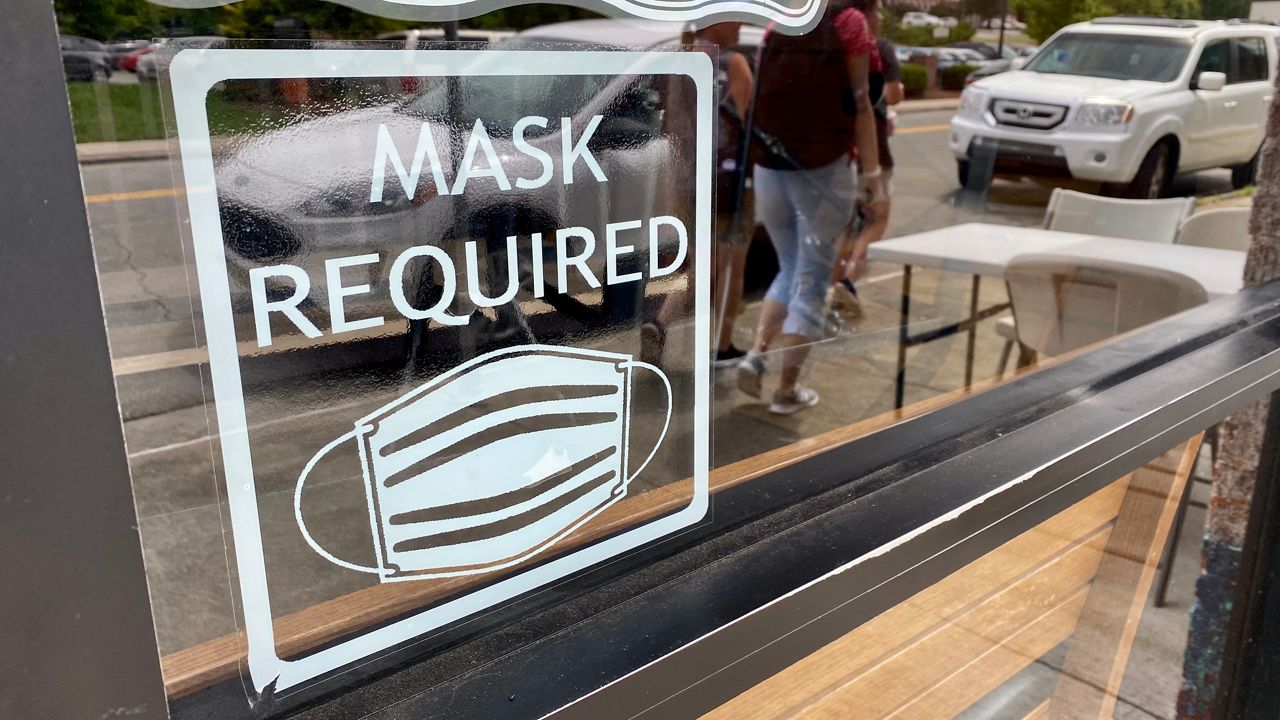 COVID case numbers and the percent positive rate in North Carolina are improving and some counties are considering dropping mask mandates. 