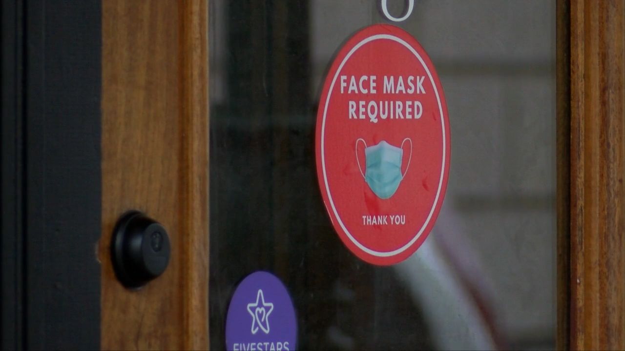 A sign on a door reading 