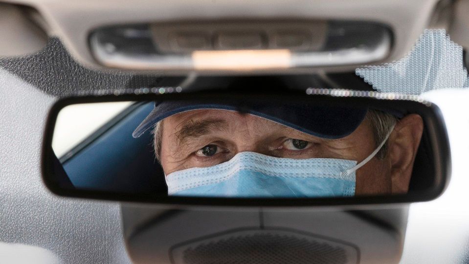 file image of a man wearing a face mask (file photo)