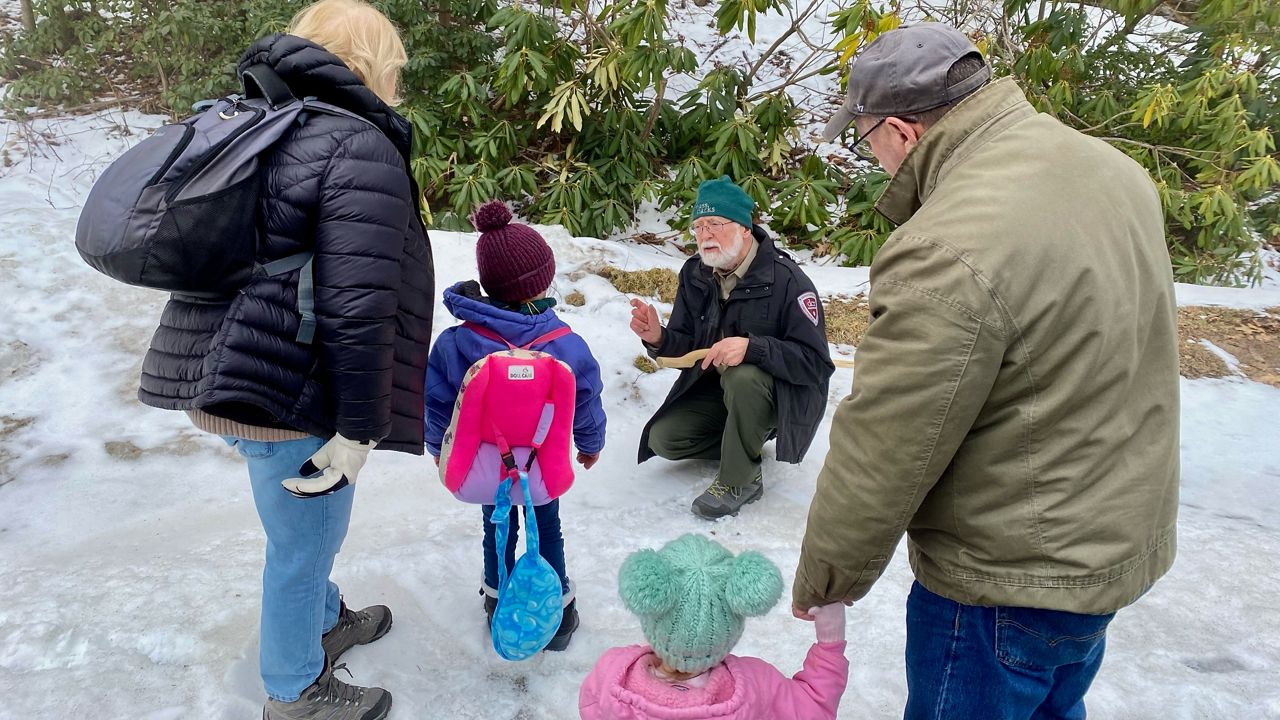 Mass DCR helps families identify animal prints in snow