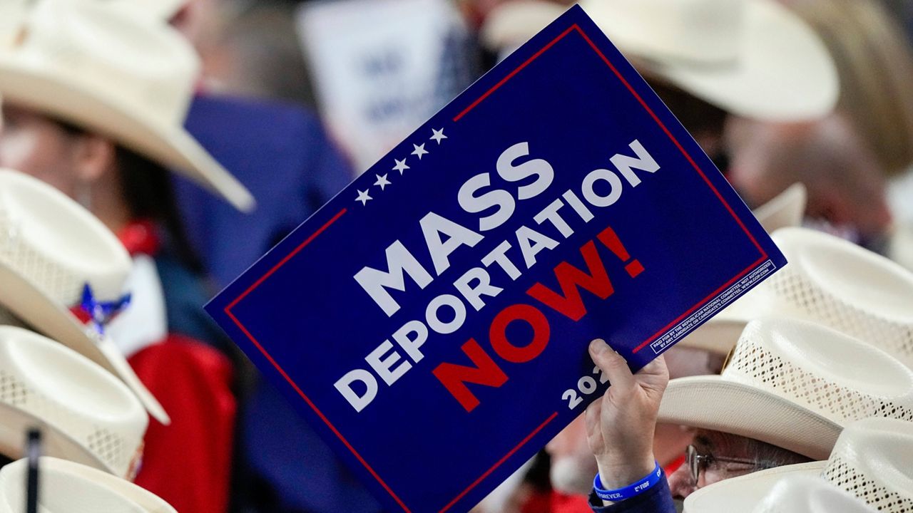 A member of the Texas delegation holds a sign during the Republican National Convention, July 17, 2024, in Milwaukee. (AP Photo/Matt Rourke, File)